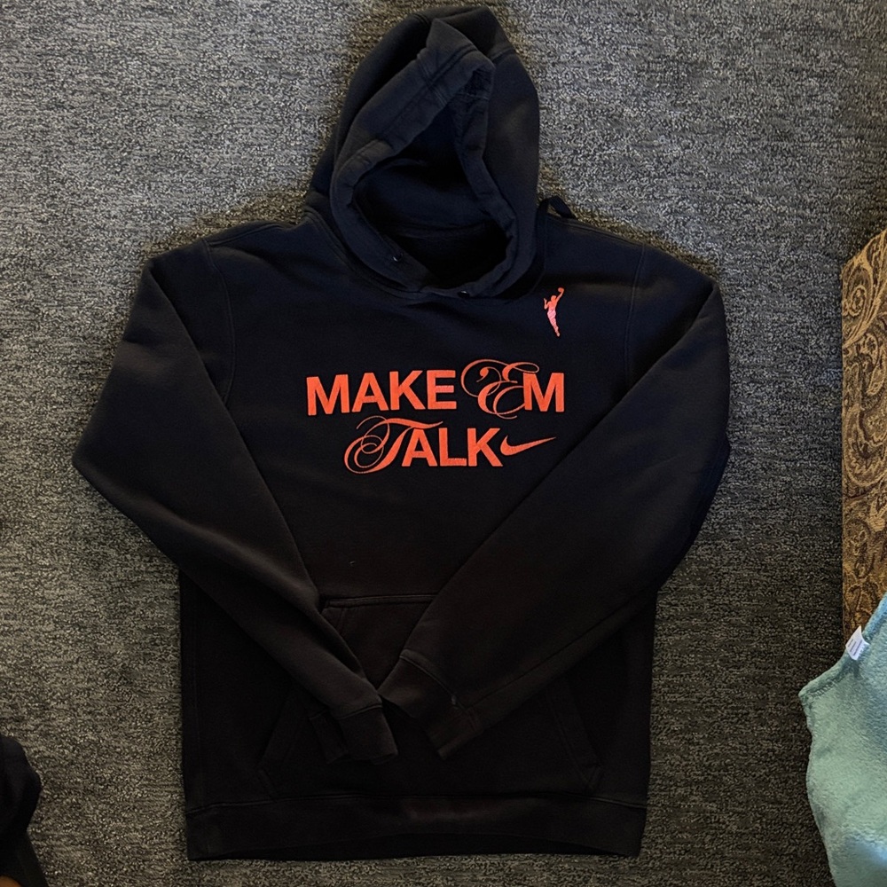 Nike Youth WNBA Black Hoodie with Vibrant Orange Text - Make ‘em Talk